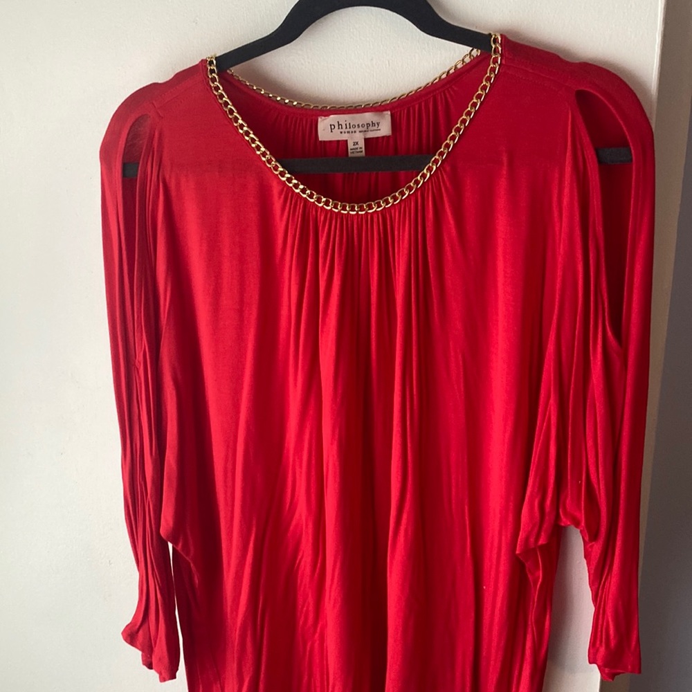 Beautiful red, 3/4 dolman sleeve with cold shoulder and gold chain detail. 2X